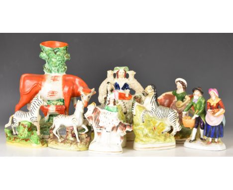 19thC Staffordshire figures including two pairs of zebras, cow and calf spill vase, cow with milkmaid etc, tallest 25cm