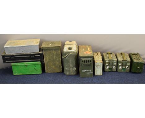 Ten military cases including shaped painted canvas or similar case marked AST, possibly to suit a radio transmitter, detonati