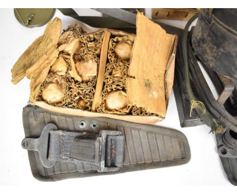 A collection of military equipment including lights, compass, bulbs etc, some in original packaging.&nbsp;