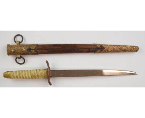 Japanese Officer's WW2 naval dirk or dagger with embossed gilt fittings, bound shagreen handle and 21cm blade, in gilt metal 