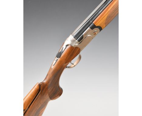 Beretta 692 12 bore over and under ejector shotgun with named locks, chequered semi-pistol grip and forend, adjustable comb, 