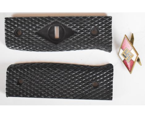 German Nazi Third Reich replacement grips for a Hitler Youth dagger with enamel emblem, marked RZM and M1/146