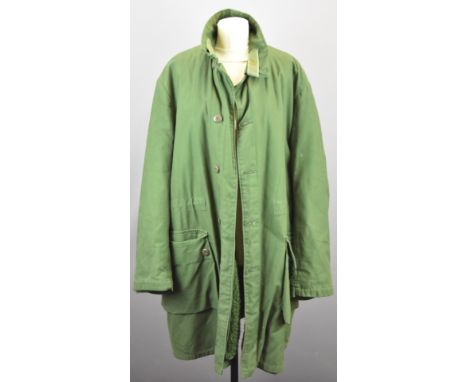 Green parka style overcoat with detachable liner, size large, together with additional quilted liner
