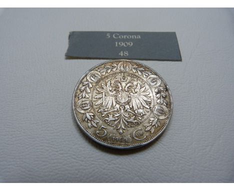 An 1909 5 Corona Austrian coin 