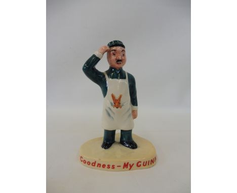 A Carltonware Guinness figure of a standing man. 