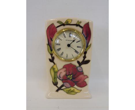 A Moorcroft magnolia mantle clock, dated '94.