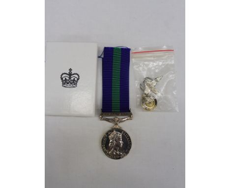 A General Service Medal, E II R &amp; Canal Zone clasp, awarded to Cpl R.E. Gee Para. plus two badges.