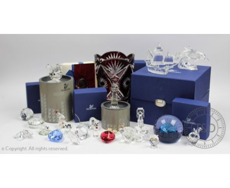 A collection of Swarovski crystal to include; a Rose (boxed), Clown (boxed), miniature Tea Set (boxed), a galleon (boxed), th