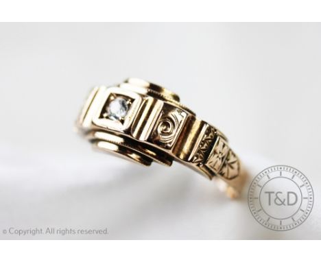 A Victorian style diamond ring, the old brilliant cut diamond within stepped yellow metal setting with engraved detail, indis