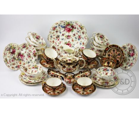 A collection of assorted tea wares, to include; a Royal Crown Derby 2451 pattern tea cup and saucer and two fan shaped pin di