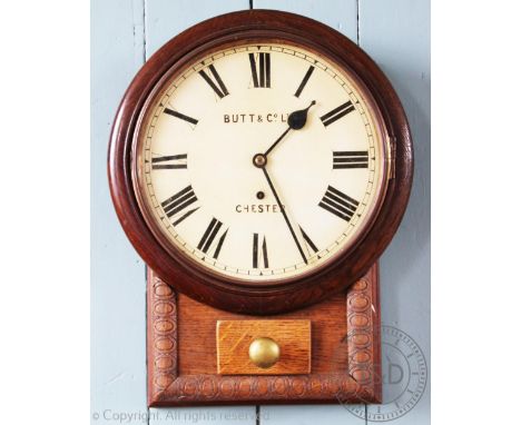 An oak and pine eight day wall clock, the enamel Roman numeral dial signed 'Butt & Co Ltd Chester', 48cm high (late 19th cent
