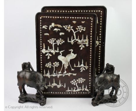 A selection of Oriental wares comprising; two mother of pearl inlaid and lacquered rectangular trays, largest 49cm, with a pa