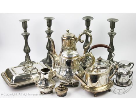 A set of four 19th century pewter push eject candlesticks, 29cm high, with a late George III silver plated oval tea pot on st