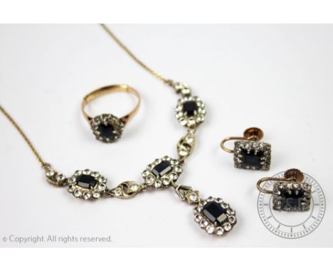 A collection of white and blue untested sapphire set jewellery, to include; a four cluster necklace, a pair of square panel s