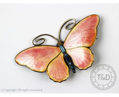 Marius Hammer: A Norwegian silver and enamelled butterfly brooch, pink basse taille enamel wings, the body in dark blue and t