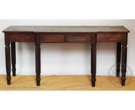 A William IV mahogany break-front serving table, with two drawers, on spiral fluted legs, 86cm H x 188cm W x 58cm D   CONDITI