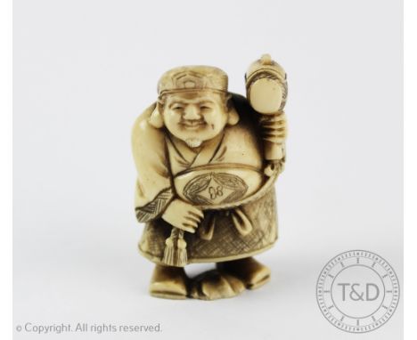 A Japanese carved ivory netsuke, Meiji period (1868-1912), modelled as a tradesman carrying a hammer, signed to underside, 5c