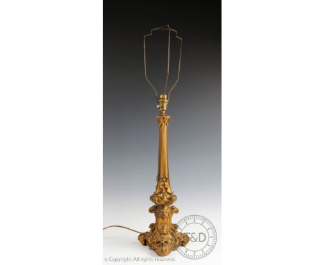 A 19th century gilt metal table lamp, modelled as an altar stick with floral and scroll detailing, 48cm H   CONDITION REPORT: