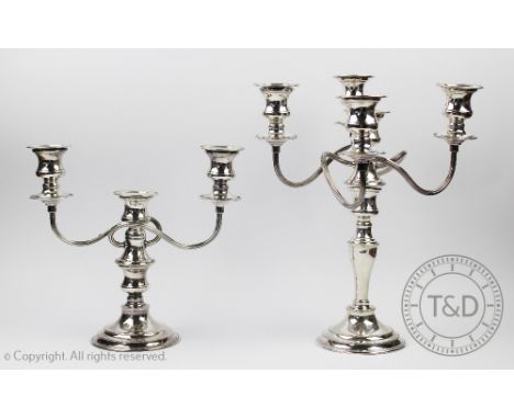 A Welsh silver plated five light candelabra, with reeded scroll sconce arms, on circular foot with beaded detailing, 34cm hig