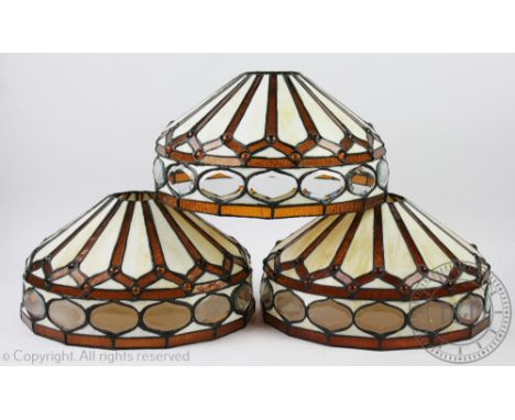 Three matching Art Deco style light shades, each of circular shape and with mottled and bevelled glass inserts, 31cm diameter