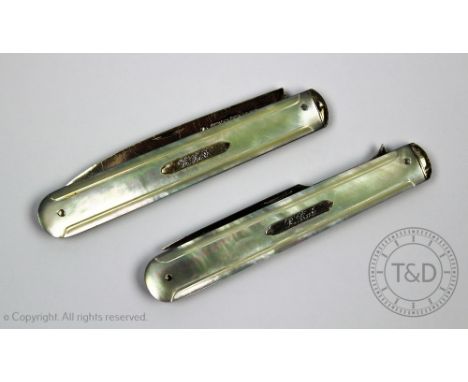 A Victorian campaign knife and fork, each folding piece with mother of pearl handle and silver blade, Sheffield 1844 (2) 