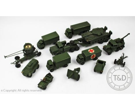 A collection  of die cast Dinky toys, military vehicles comprising Tank Transporter 660, Centurion Tank 651, Scout car 673, m