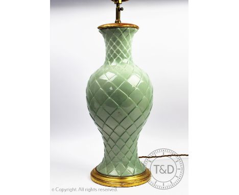 A celadon type glaze table lamp, four light, with gilt wood upper mount and base, 45cm (size does not include the bulb fittin