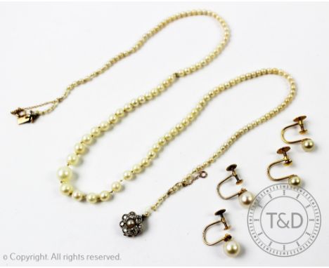 A single strand graduated untested pearl necklace with diamond set daisy cluster clasp, largest pearl (measures 6mm diameter)