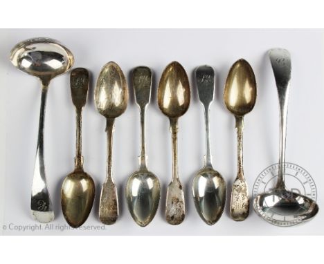 A set of six Victorian silver fiddle pattern tea spoons, Exeter 1847, with a pair of silver sauce ladles, William Hutton and 