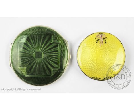 An Art Deco silver and enamel compact, Turner & Simpson, Birmingham 1933, the circular hinged cover enamelled in green with a