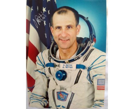 NASA Astronaut Donald Pettit signed colour portrait photo 8 x 6 inches. Nice pose in white space suit of the veteran cosmonau