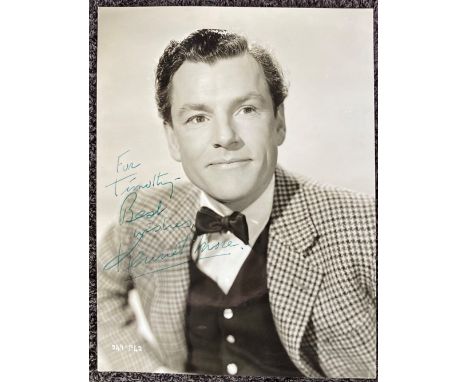Kenneth More signed vintage 10 x 8 b/w portrait photo dedicated to Timothy. Good condition. All autographs are genuine hand s