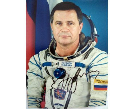 Cosmonaut Nikolai Budarin signed colour portrait photo 8 x 6 inches. Nice pose in white space suit of the veteran astronaut. 