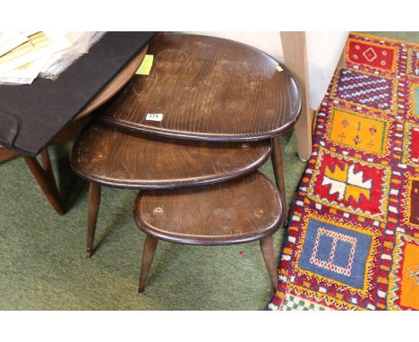 Nest of 3 Dark Tone Ercol Pebble tables on tapering legs 