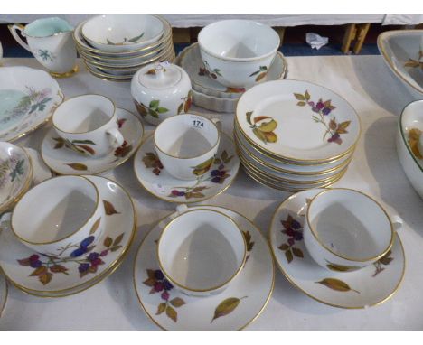 A Collection of Royal Worcester Evesham Pattern Tea Wares Comprising Five Trios, One Saucer, Three Side Plates, Six Fruit Bow