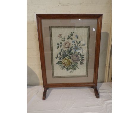 An Edwardian Oak Framed Tapestry Fire Screen, Roses, 68cm high 