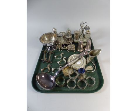 A Tray of Silver Plate to include Napkin Rings, Large Ladle, Rose Bowl, Knife Rests, Cruets, Basket Etc