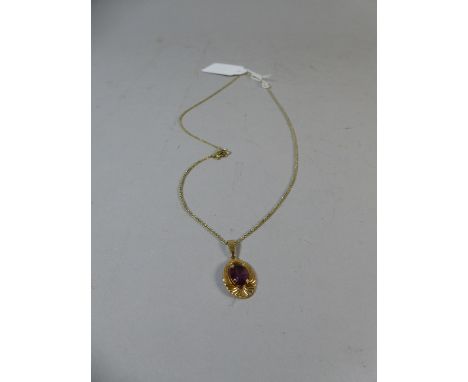 A 9ct Gold Pendant with Amethyst Stone on Necklace Chain