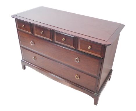 A Stag Minstrel mahogany chest: moulded top above four top drawers and two full-width drawers below, raised on bracket-style 
