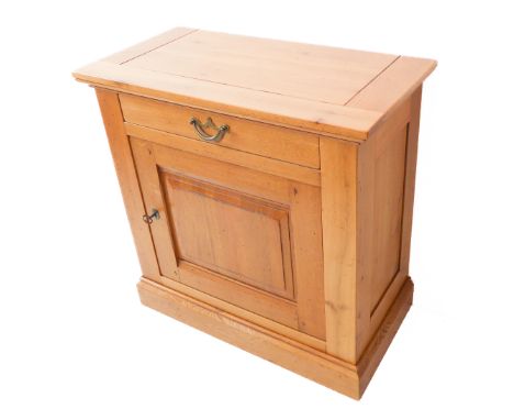 A reproduction style solid light oak side cabinet: the overhanging top with cleated ends above a single full-width drawer and