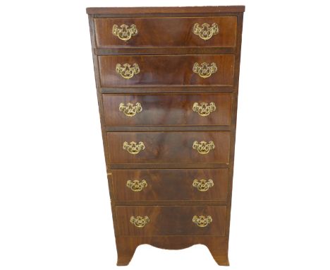 A mahogany chest of slim proportions in George III style (later): mahogany crosshanded top above an arrangement of six full-w