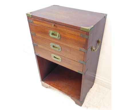 A reproduction military-style brassbound side chest: brushing slide to the top, three full-width drawers with recessed brass 