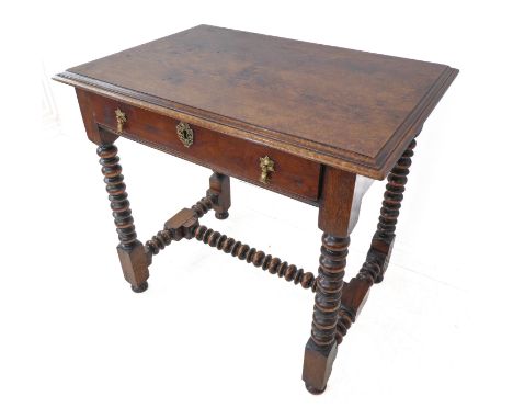 A good late 17th century style (reproduction) solid oak side table: the thumbnail moulded slightly overhanging top above sing