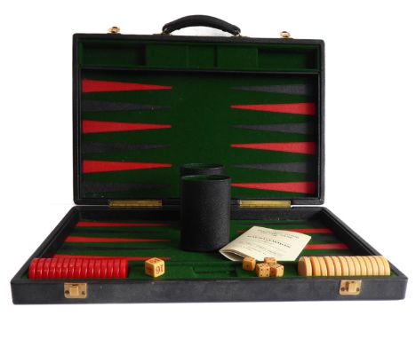 A large backgammon board by H.P.G. & S. Ltd. - London (64cm x 48cm open). Hardly used and with instructions by 'Jackpot', but