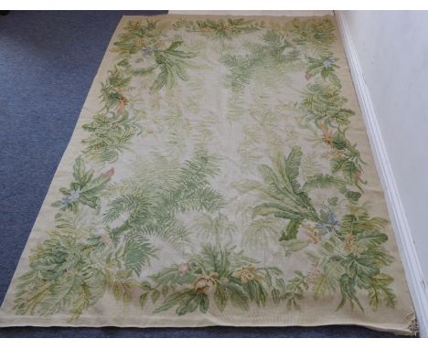 A hand-stitched flat-weave tapestry decorated with flowering shrubs and leaves (222cm x 157cm)