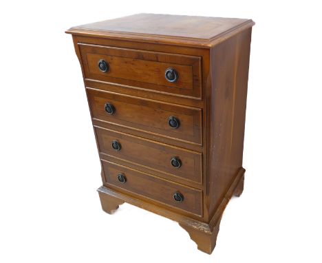 A modern reproduction Georgian-style crossbanded yew wood chest with four drawers on bracket feet (47cm wide x 36.5cm deep x 