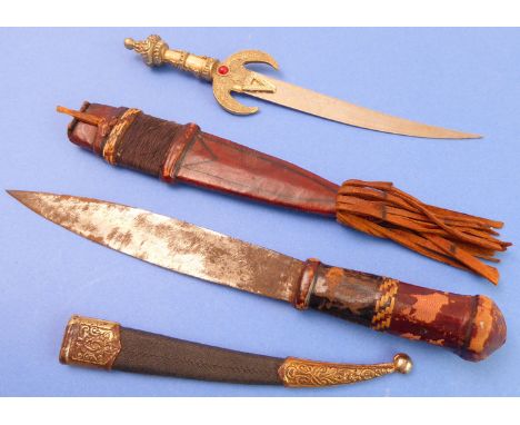 A continental leather-handled dagger (probably early to mid 20th century) and leather scabbard with tassels (knife and handle