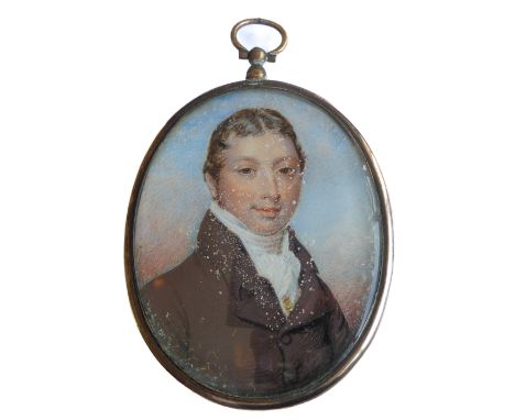 A mid-19th century portrait miniature shoulder-length portrait study of a young gentleman wearing a white cravat and brown ja