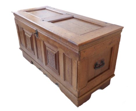 A large and unusual early 19th century Dutch oak and inlaid chest: the heavy lid on iron strap hinges and opening to reveal a