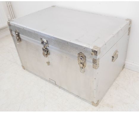 A large silver-coloured storage/travelling trunk (97cm wide x 63cm deep x 56cm high)